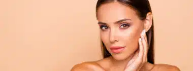 Woman with smooth facial skin after dermaplaning in Denver, CO