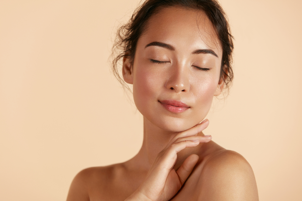Woman with glowing skin from OxyGeneo Facial in Denver, CO