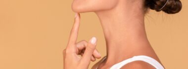 Close up of woman's sculpted chin and jawline from dermal fillers in Denver, CO