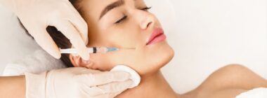 Woman getting Sculptra facial injections in Denver, CO